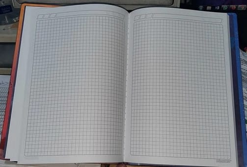 CUADERNO CUADRICULADO .100 HOJAS . 18 X 25 CM.